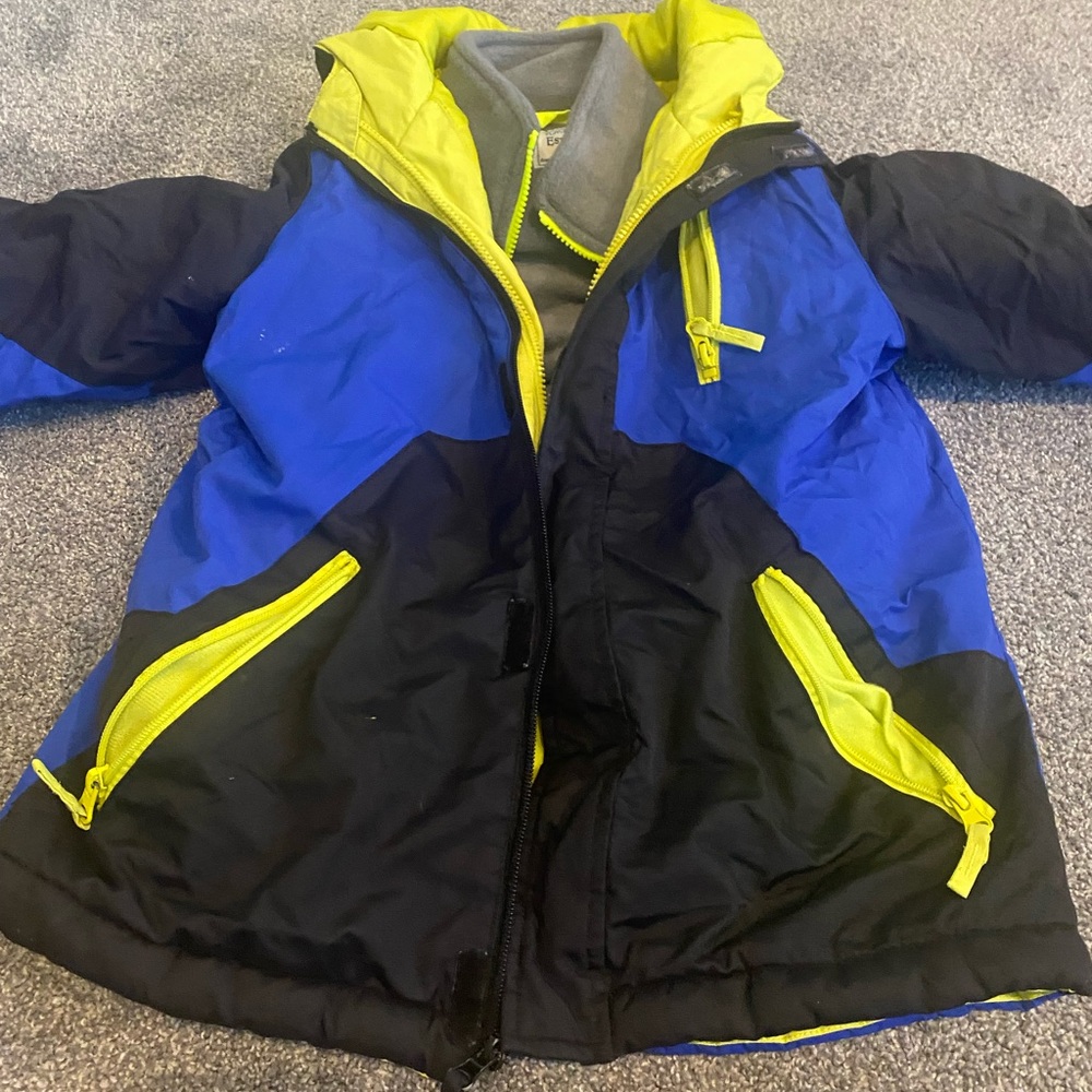 Jacket w/ warm insert there is 3 little white spots on the jacket selling cheap